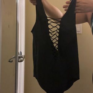 Deep v neck body suit in black
